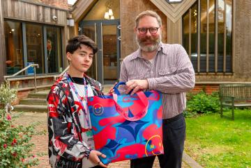 Bag made of recycled materials made by 18-year-old care leaver on display in Cookham